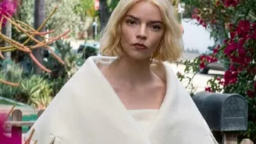 Lucky 2026 Anya Taylor-Joy White Belted Coat worn by Luciana 'Lucky' Armstrong (Anya Taylor-Joy) as seen in Lucky (S01)