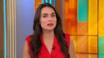 Haut cache-cœur long Zaca de Simon Miller porté par Lilia Luciano dans l'émission CBS Mornings du 21 juillet 2026.