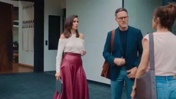 Commense Wave Hem Faux Leather Midi Skirt worn by Erik Hayser as seen in My Daughter's Father (S01E01)