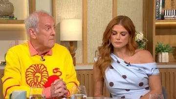 Robe midi maxi bleue à pois et péplum de River Island portée par Ashley James dans l'émission This Morning le 24 juillet 2026.