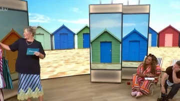 Jupe midi rayée Maeva de Never Fully Dressed portée par Laura Puddy dans l'émission This Morning du 23 juillet 2026.