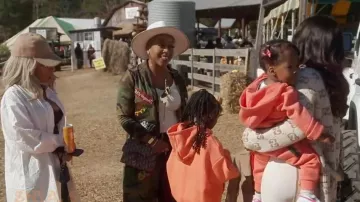 Christian Dior Oblique Saddle Chain Pouch Blue worn by Pinky Cole as seen in The Real Housewives of Atlanta (S17E17)