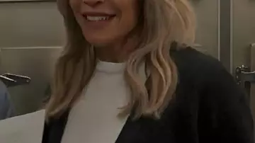 This Merino Cardigan worn by Dee Reynolds (Kaitlin Olson) in It's Always Sunny in Philadelphia (S18E02)