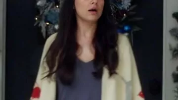 Cárdigan de pescador navideño de Mila Kunis en "A Bad Moms"