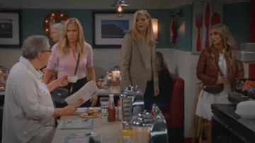 All Saints Mini Vega Suede Shoulder Bag worn by Jessie (Lainey Wilson) as seen in Leanne (S02E08)