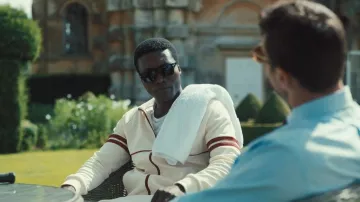 Camiseta de chándal Sergio Tacchini x Stuarts Orion llevada por Nanny (Benjamin Clementine) vista en The Gentlemen (S02E03)