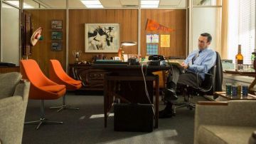 The authentic chairs oranges in the office of Don Draper (Jon Hamm) in Mad Men