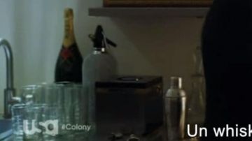 The bottle of champagne Moët in Colony S01E01