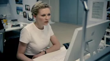 The desktop computer of Alison Olsen (Kirsten Sanitizer.) in An Englishman in New York