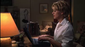The computer Apple Powerbook 3400 Kathleen Kelly (Meg Ryan) in You've got a message