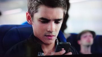 The smartphone Apple iPhone 4 Angelo (Brenton Thwaites) in Ride