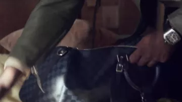 Le sac Louis Vuitton de Maitre Gims dans Tout Donner