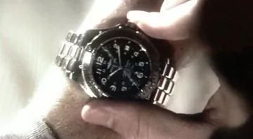The Breitling watch of T. J. Thyne in Shuffle
