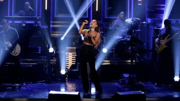 The shoes black that Ariana Grande is wearing in The Tonight Show starring Jimmy Fallon