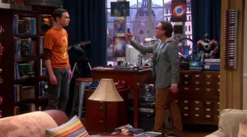 The orange t-shirt with "Flash" Sheldon Cooper in The Big Bang Theory