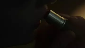 Offred's (Elizabeth Moss) MAC red lipstick in The Handmaid's Tale S01E08