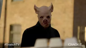 The mask of a pig carried by Albert Hill / Albie (Luke Pasqualino) in Snatch season 1