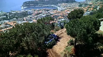The view over the city of Monaco and the scene of the picnic in the hand at The collar of Alfred Hitchcock
