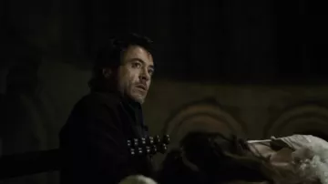 The authentic baton of Sherlock Holmes (Robert Downey Jr) in the opening scene