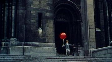 The Church Notre-Dame-de-la-Croix, Place de Ménilmontant, in Paris in The red balloon