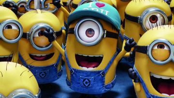 The figurine of the Minion wearing the hat I <3 Gru (I love Gru) in Me, Ugly and Nasty 3