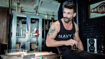 The tank top black, Navy ST of Alvey Kulina (Frank Grillo) in Kingdom