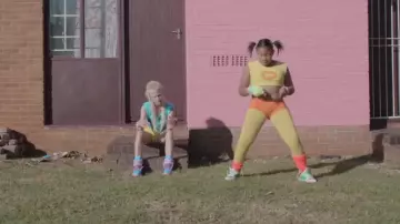 The t-shirt with blue printed dolphins of Yolandi Visser in the movie clip Baby s on Fire Die Antwoord