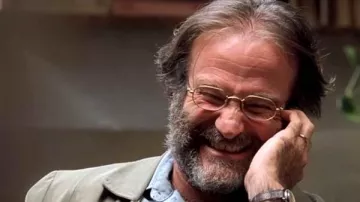 Looks de la película Will Hunting: Sean Maguire (Robin Williams) lleva un chaleco de lana verde con cuadros
