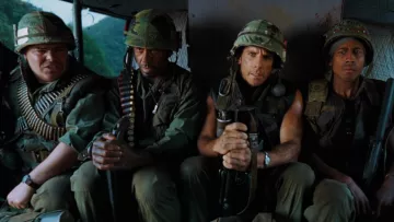 The authentic military helmet worn by Kirk Lazarus (Robert Downey Jr.) in the movie Thunder in the Tropics