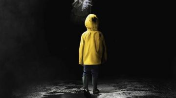 The waxed yellow Georgie Denbrough (Jackson Robert Scott) in It