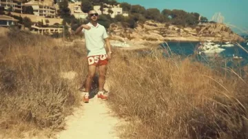 The red bathing shorts Dsquared2 in the clip Evil Djadja & Dinaz Ft. Dj Babs