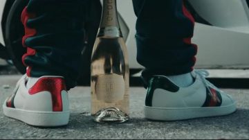 The Gucci in the clip Lamborghini Doors of Rick Ross