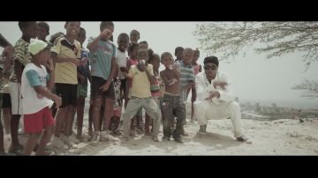 The Converse in the Red clip and blue-Kalash feat. Booba