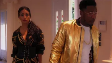 La chaqueta bomber ASOS dorada de Niska en los Clips