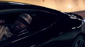La veste Distinct Vendôme blanche de Rohff dans le clip Dans le game