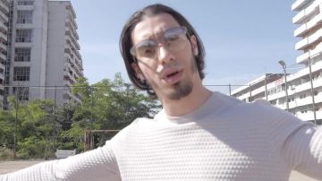 The Calvin Klein sweater from Our in the clip The world or nothing about NLP
