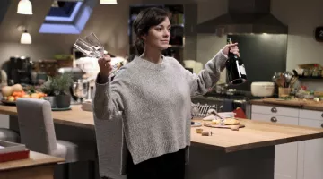 The gray sweater worn by Marion Cotillard in a Rock ' n Roll