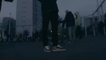 The pair of sneakers Puma Suede violet in the clip dark shades feat. S. Pri Noir Alpha Wann