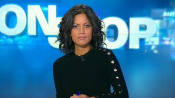 The sweater with golden buttons on a sleeve Aurélie Case in BFM non stop 21/09/2017