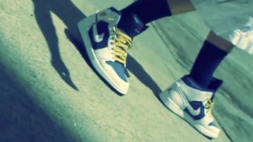 The pair of Nike Air Jordan 1 Phat "Olympic" in the clip RABiES (feat. Ghetty) Riff Raff