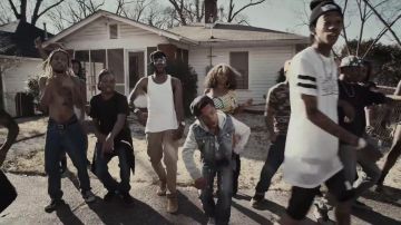 The pair of Converse Chuck Taylor All Star low black in the clip in the clip We Dem Boyz of Wiz Khalifa