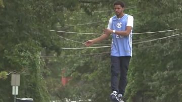 The pair of Nike Air Jordan 3 "sport blue" in the clip Dreams from J Cole
