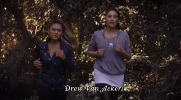 The pull to the laces of Emily (Shay Mitchell) in Pretty Little Liars