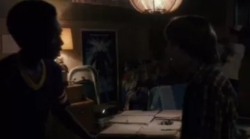 The poster for the movie The Thing on the wall in the basement of Mike Wheeler (Finn Wolfhard) in Stranger Things Season 1 Episode 1