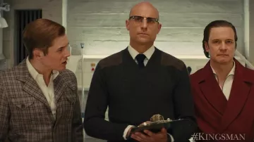 Le pull en laine de Merlin (Mark Strong) dans Kingsman : Services Secrets