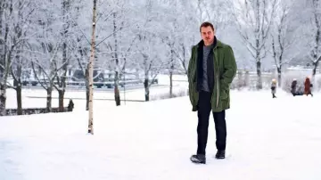 Outfits of The Snowman: Michael Fassbender wears Green coat to portray Detective Harry Hole in the movie