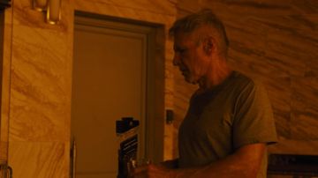 The bottle of Johnnie Walker whiskey open by Rick Deckard (Harrison Ford) in Blade Runner 2049