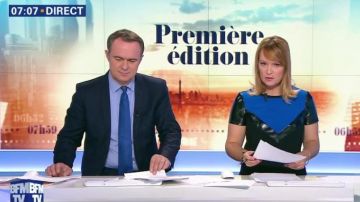 The black dress and blue Adeline Francis in First edition on BFMtv the 05/10/2017