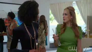 The green dress Alexander McQueen worn by Fallon Carrington (Elizabeth Gillies) in Dynasty 1x06