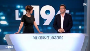 Vestido de botones decorativo de Nathalie Renoux en el diario M6 el 19/45 del 25/11/2017